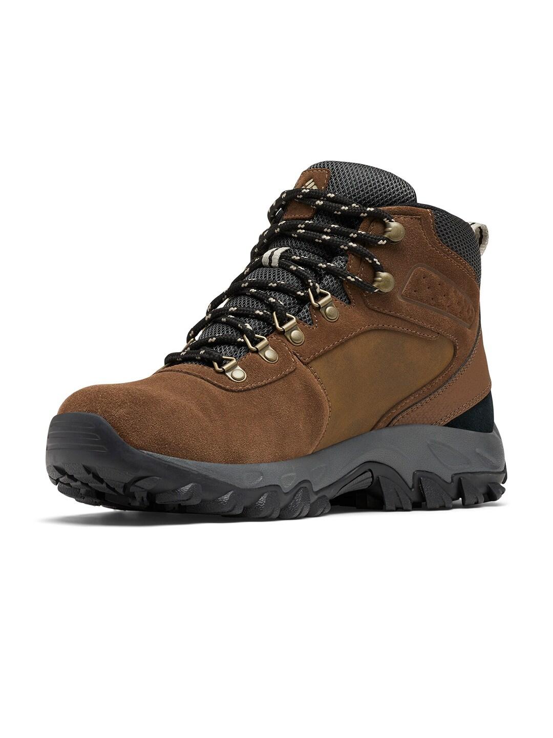 A Men Wearing Columbia Men Brown NEWTON RIDGE PLUS II SUEDE WP