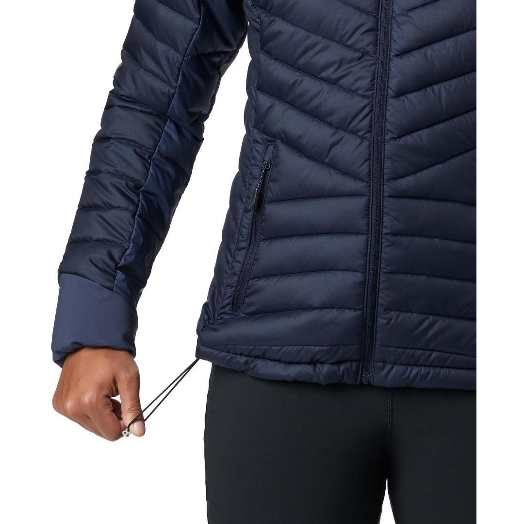 A Women Wearing Columbia Women Navy Blue Windgates Hooded Jacket