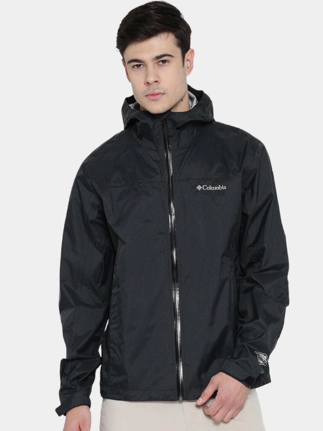 A Men Wearing Columbia Men Black EvaPOURation Jacket Waterproof