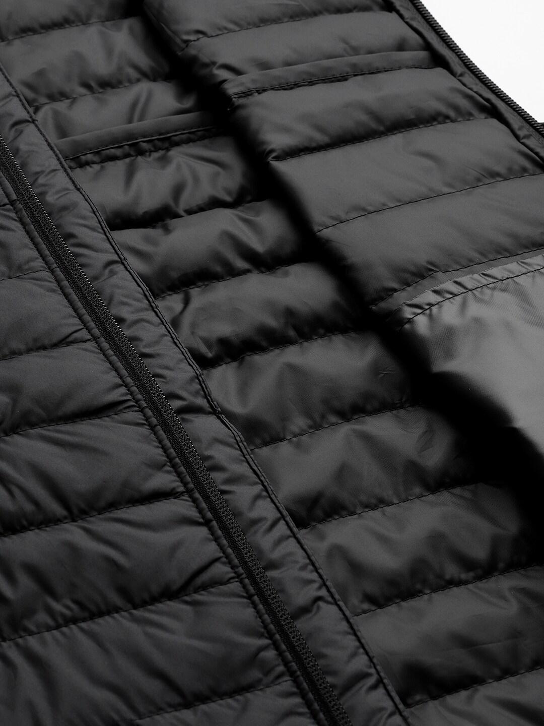 A Men Wearing Columbia Men Black Silver Falls Vest