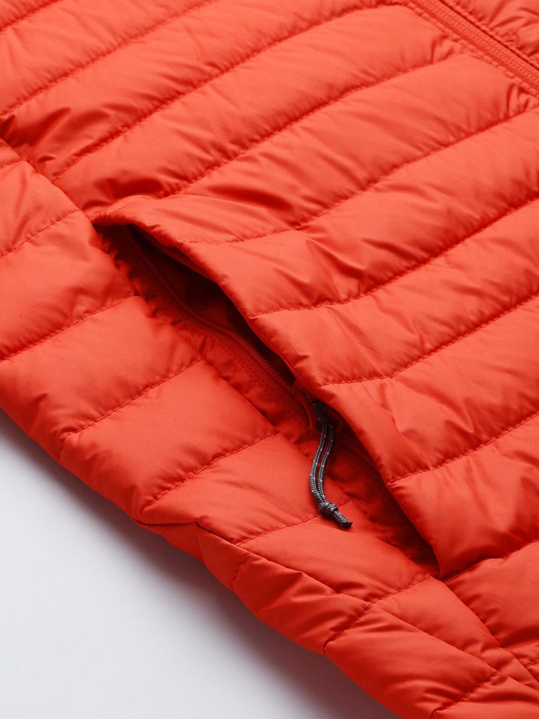 A Men Wearing Columbia Men Orange Silver Falls Vest