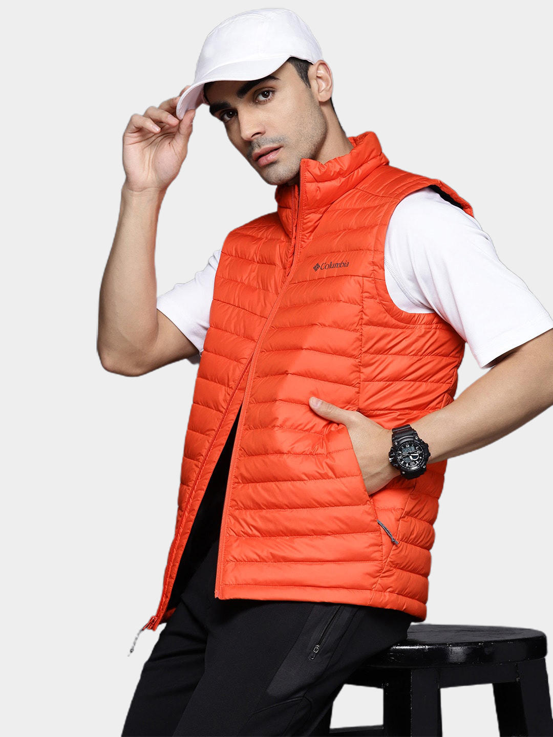 A Men Wearing Columbia Men Orange Silver Falls Vest