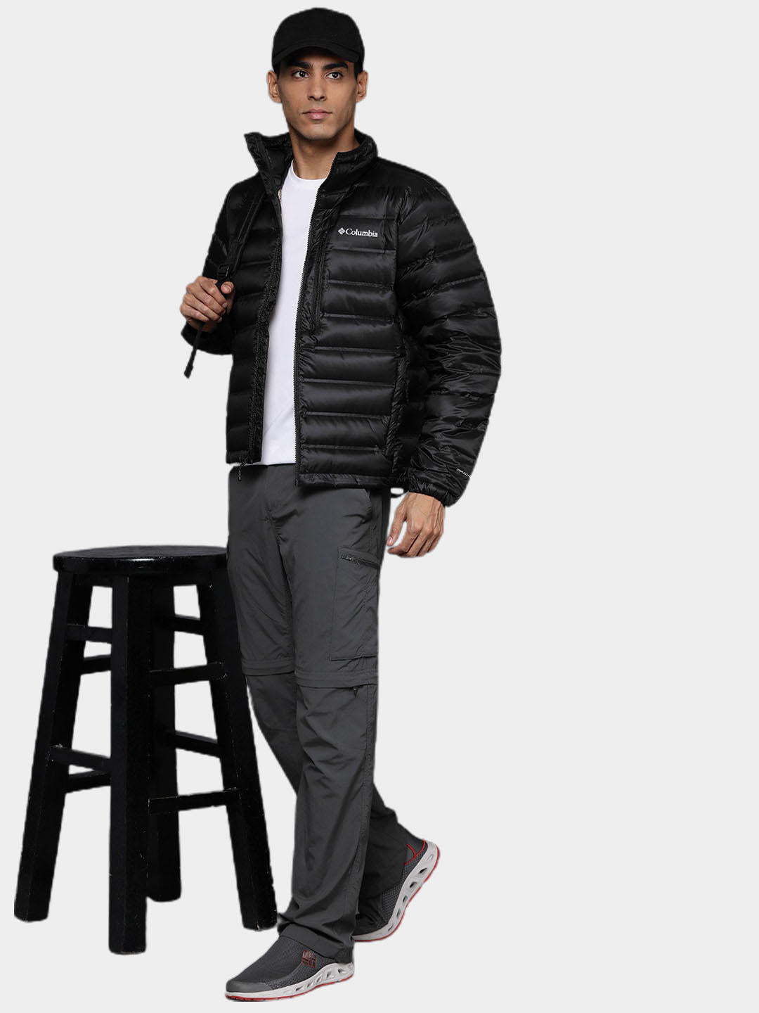 A Men Wearing Columbia Men Black Pebble Peak Down Jacket