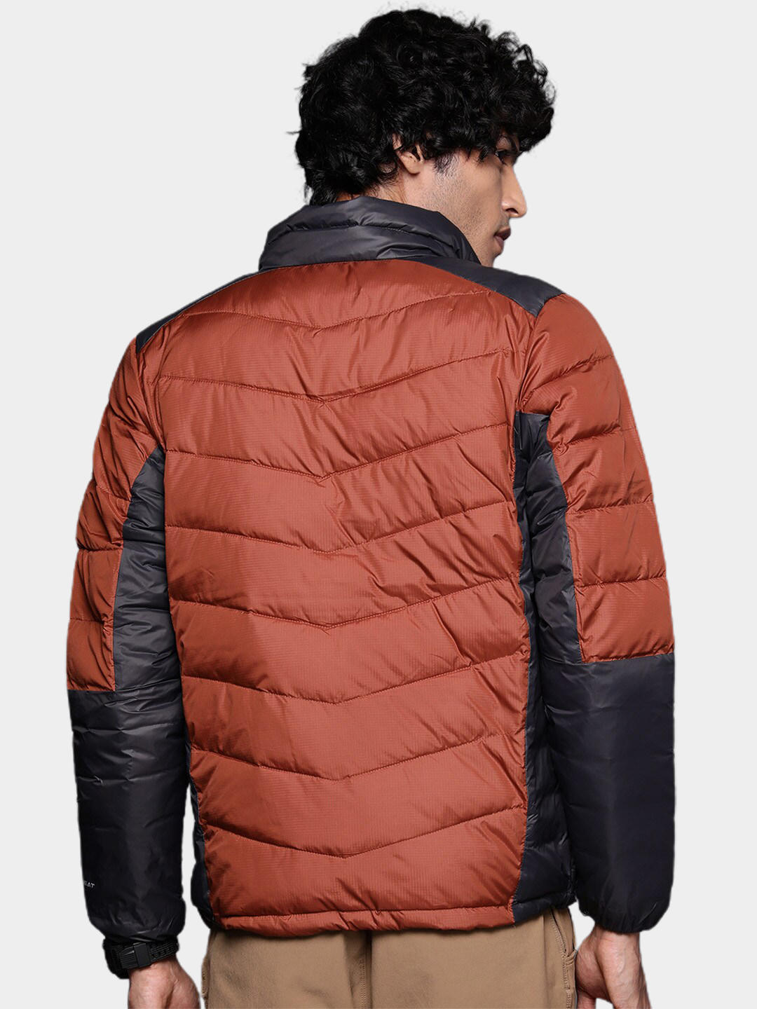 A Men Wearing Columbia Men Orange Labyrinth Loop Jacket