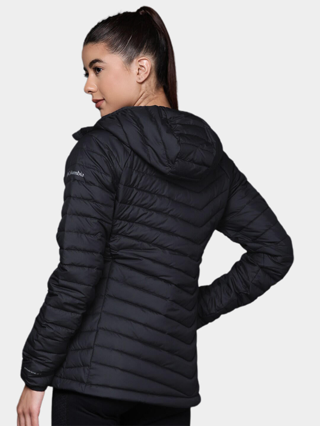 A Women Wearing Columbia Women Black Powder Lite Hooded Jacket