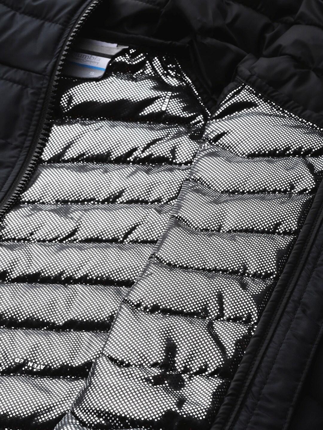 A Women Wearing Columbia Women Black Powder Lite Hooded Jacket