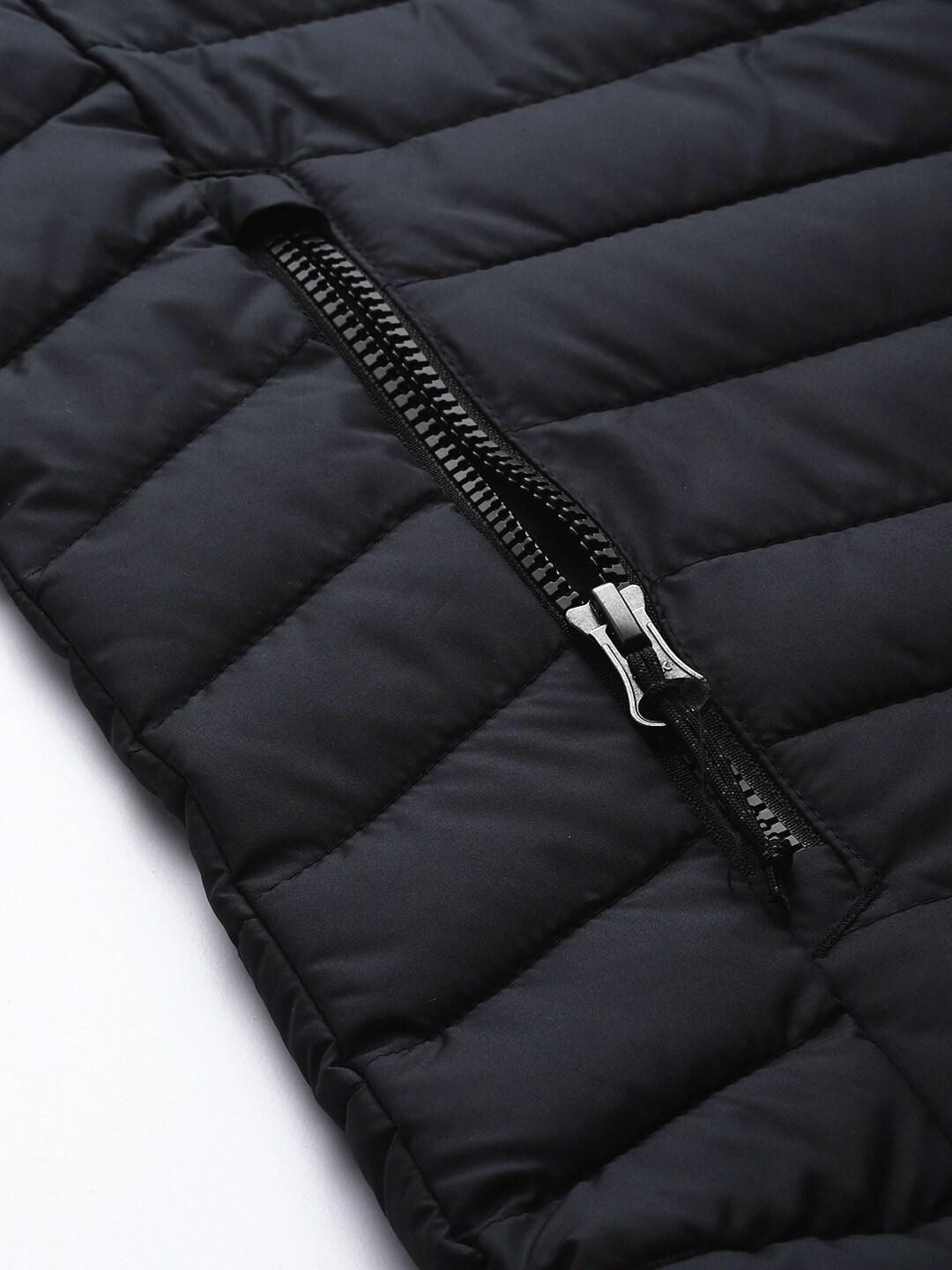 A Women Wearing Columbia Women Black Powder Lite Hooded Jacket