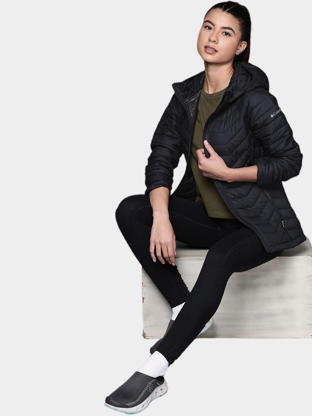 A Women Wearing Columbia Women Black Powder Lite Hooded Jacket