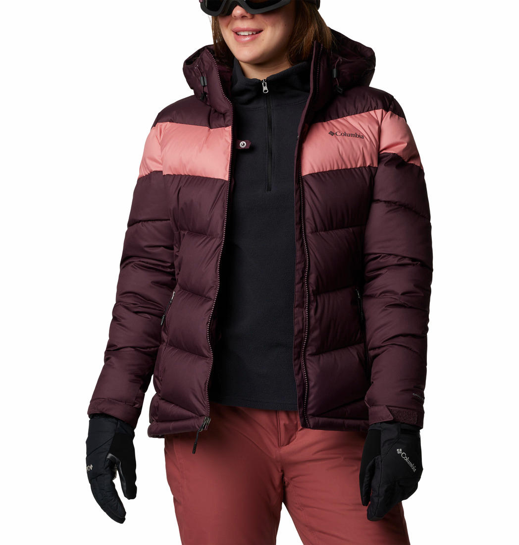 A Women Wearing Columbia Women Red Abbott Peak II Insulated Jacket