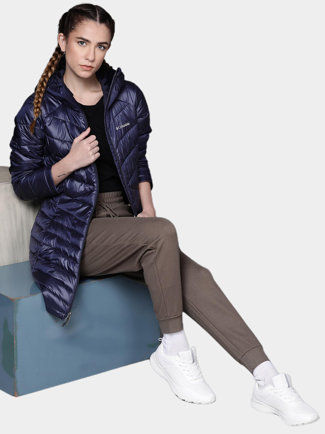 A Women Wearing Columbia Women Navy Blue Joy Peak Mid Jacket