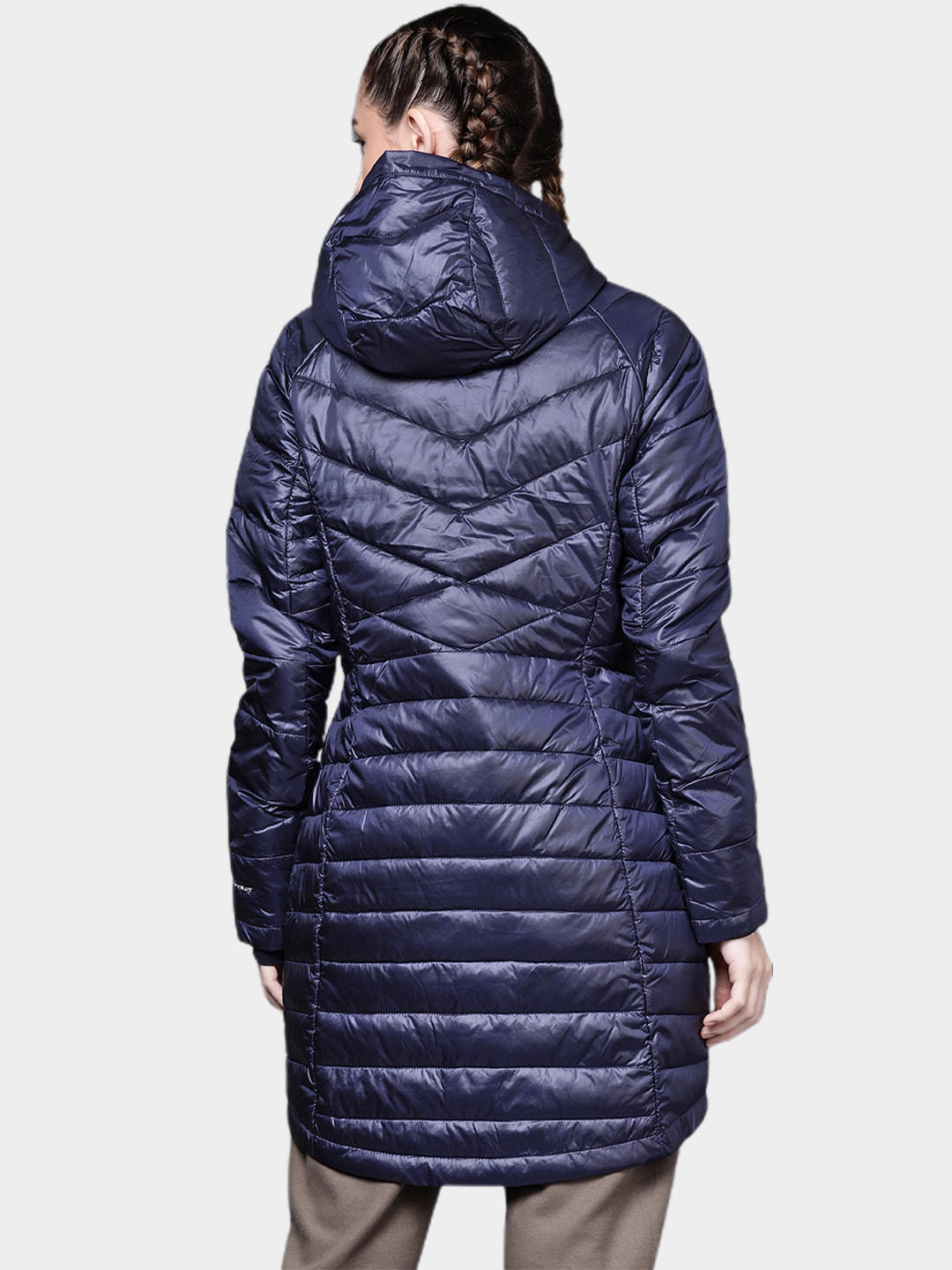 A Women Wearing Columbia Women Navy Blue Joy Peak Mid Jacket