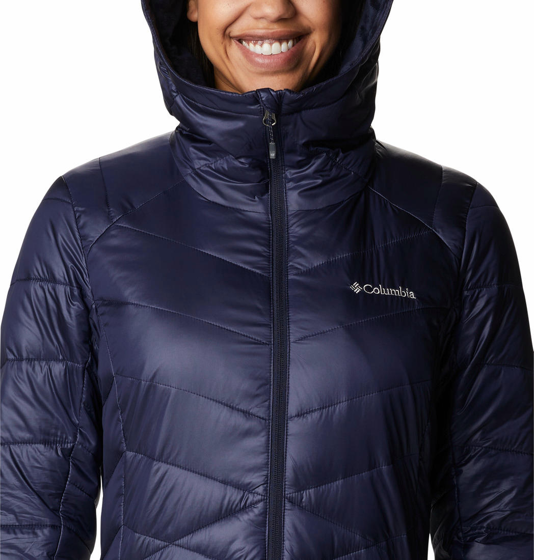 A Women Wearing Columbia Women Navy Blue Joy Peak Mid Jacket