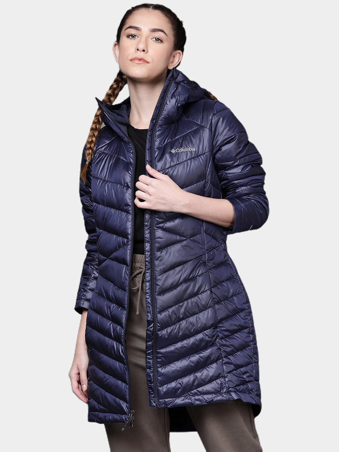 A Women Wearing Columbia Women Navy Blue Joy Peak Mid Jacket