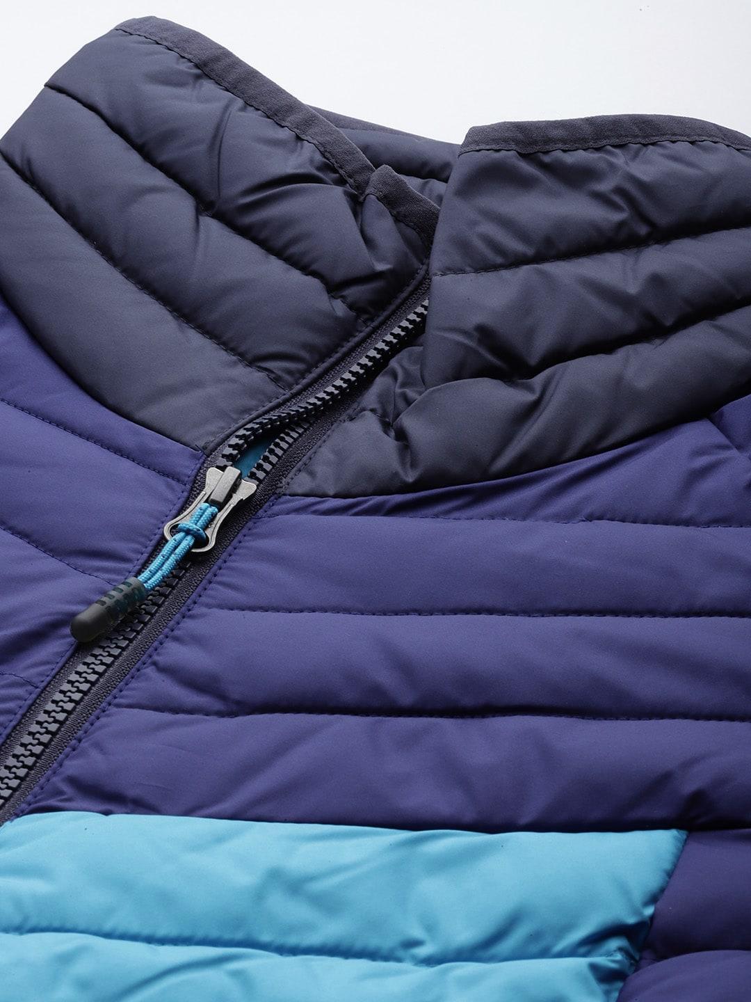 A Women Wearing Columbia Women Blue Powder Lite II Full Zip Jacket