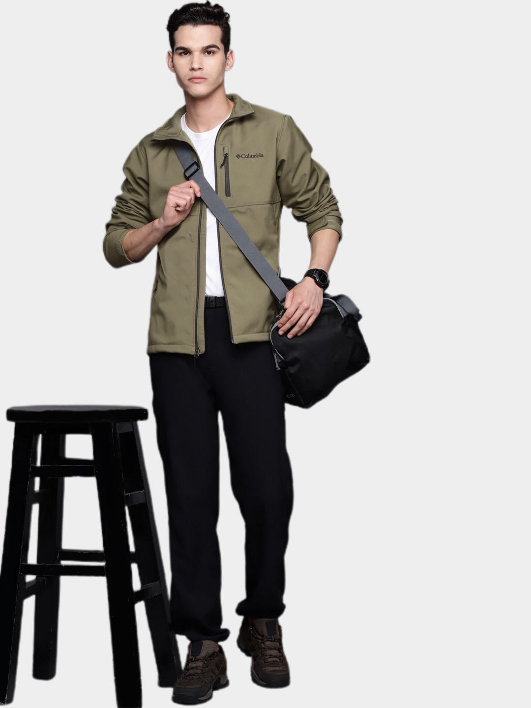 A Men Wearing Columbia Men Green Ascender Softshell Jacket