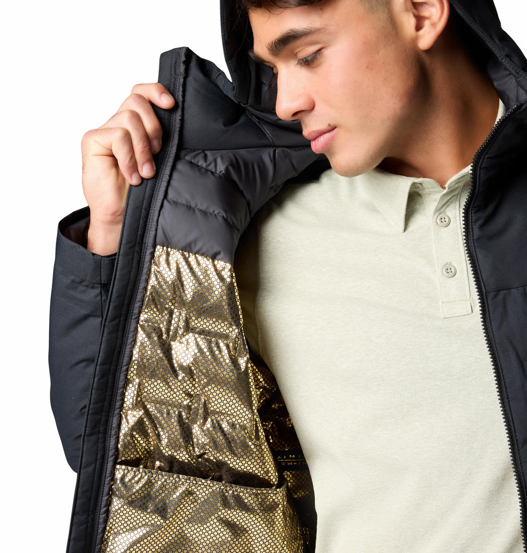 A Men Wearing Columbia Men Black Grand Trek III Down Hooded Jacket