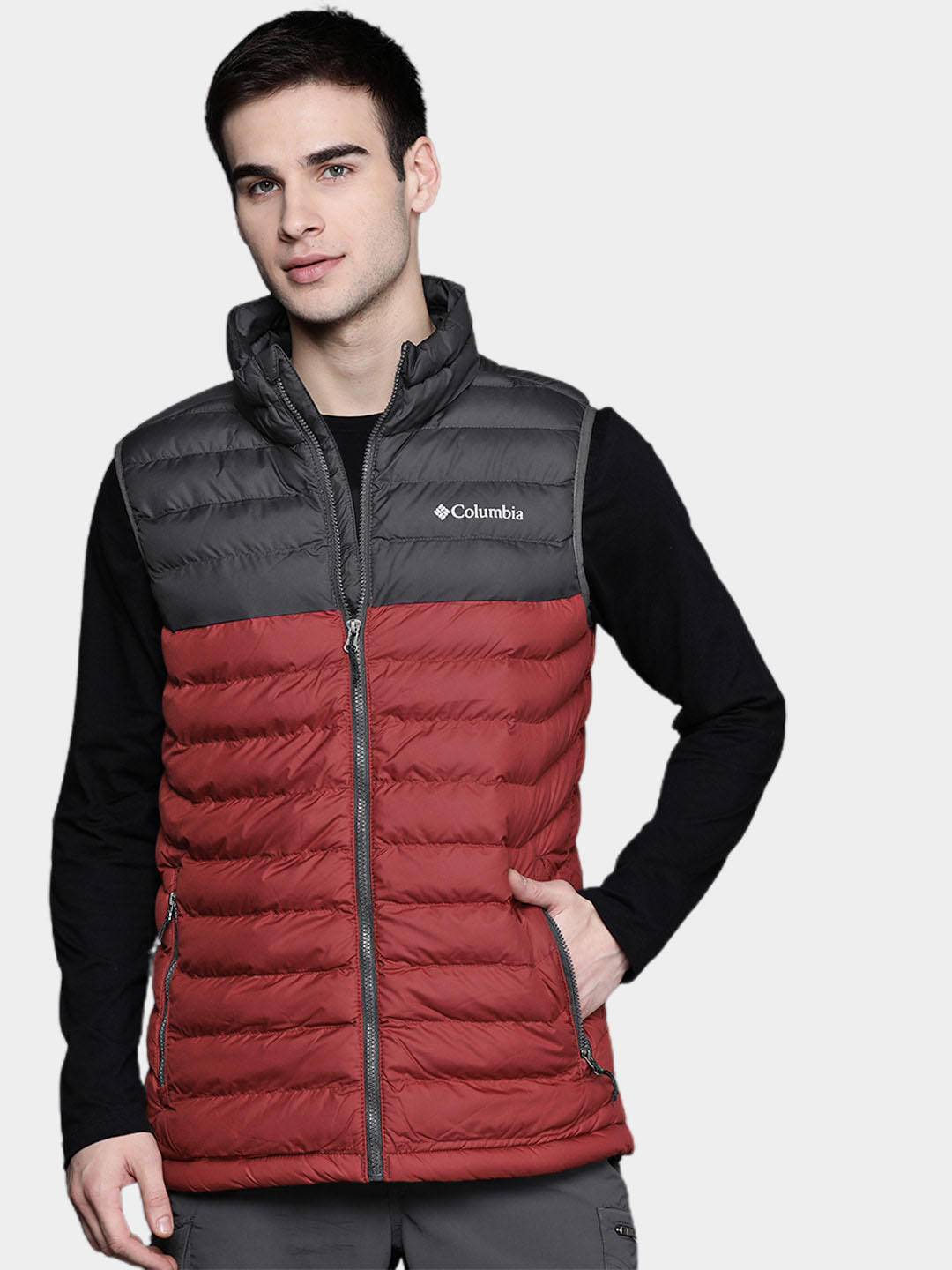 A Men Wearing Columbia Men Red Powder Lite Vest