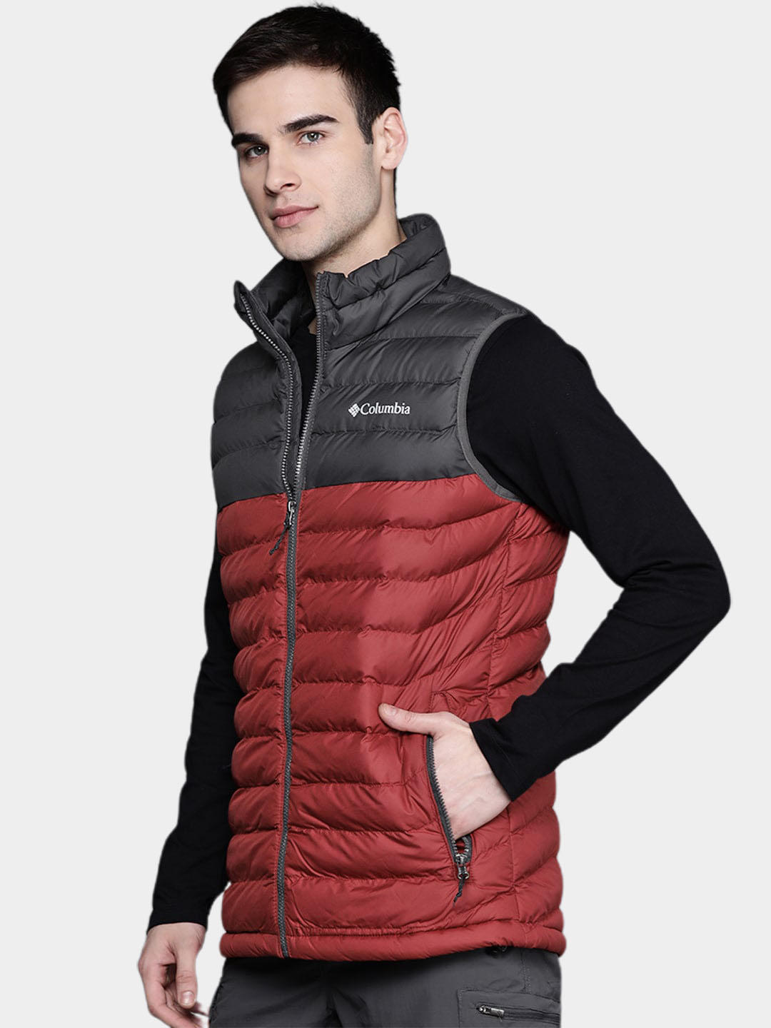 A Men Wearing Columbia Men Red Powder Lite Vest