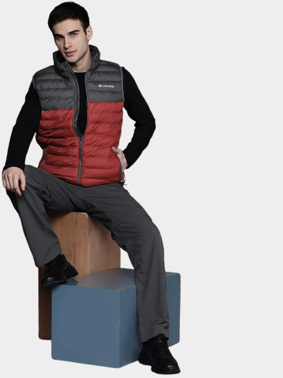 A Men Wearing Columbia Men Red Powder Lite Vest