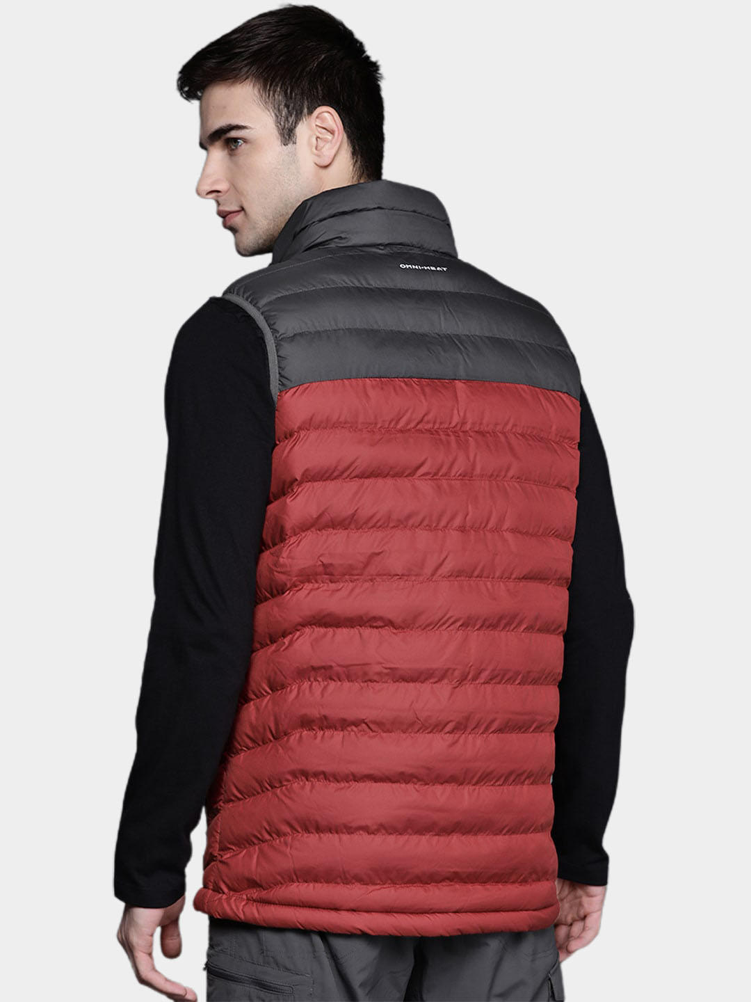 A Men Wearing Columbia Men Red Powder Lite Vest