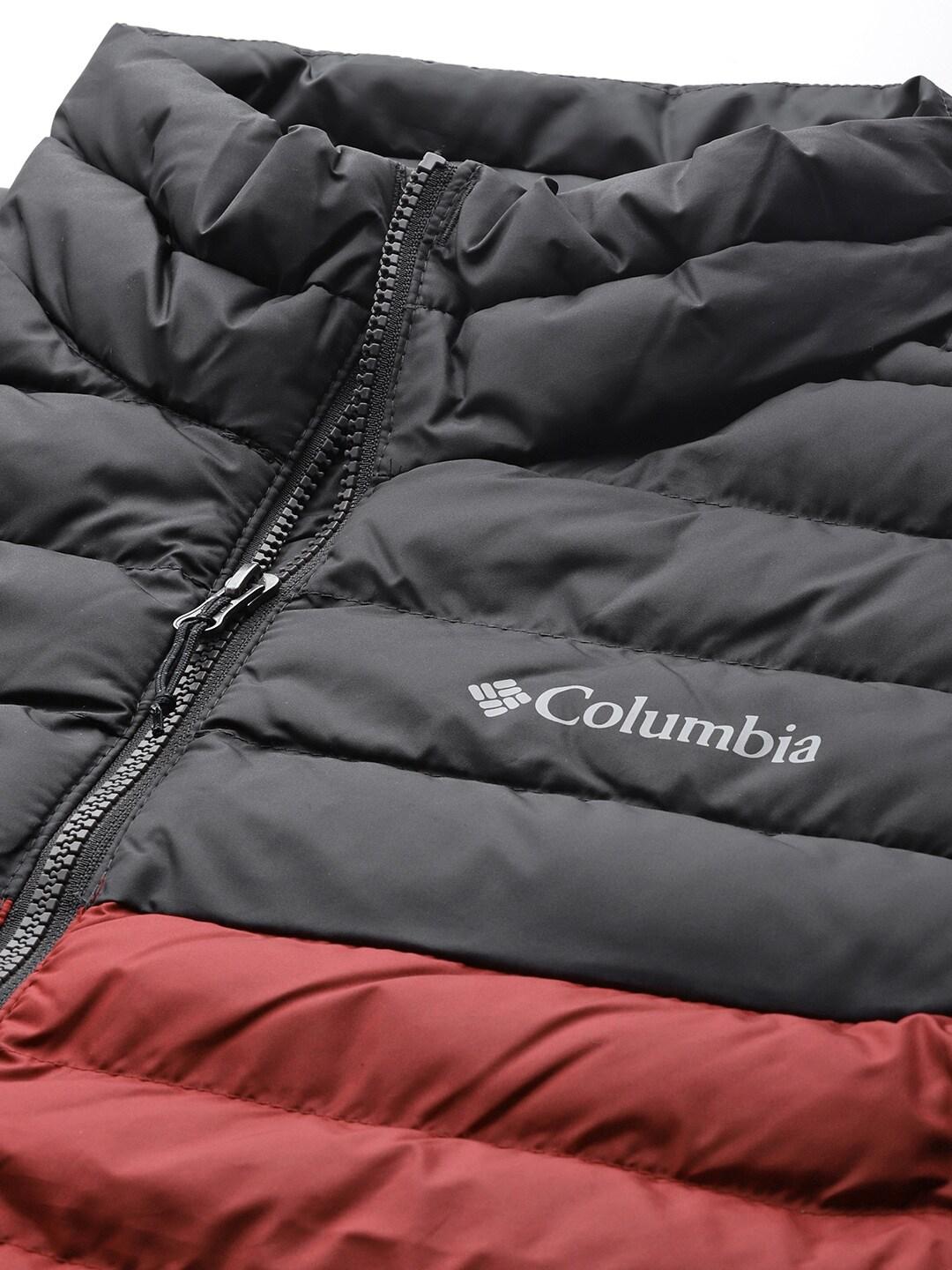 A Men Wearing Columbia Men Red Powder Lite Vest