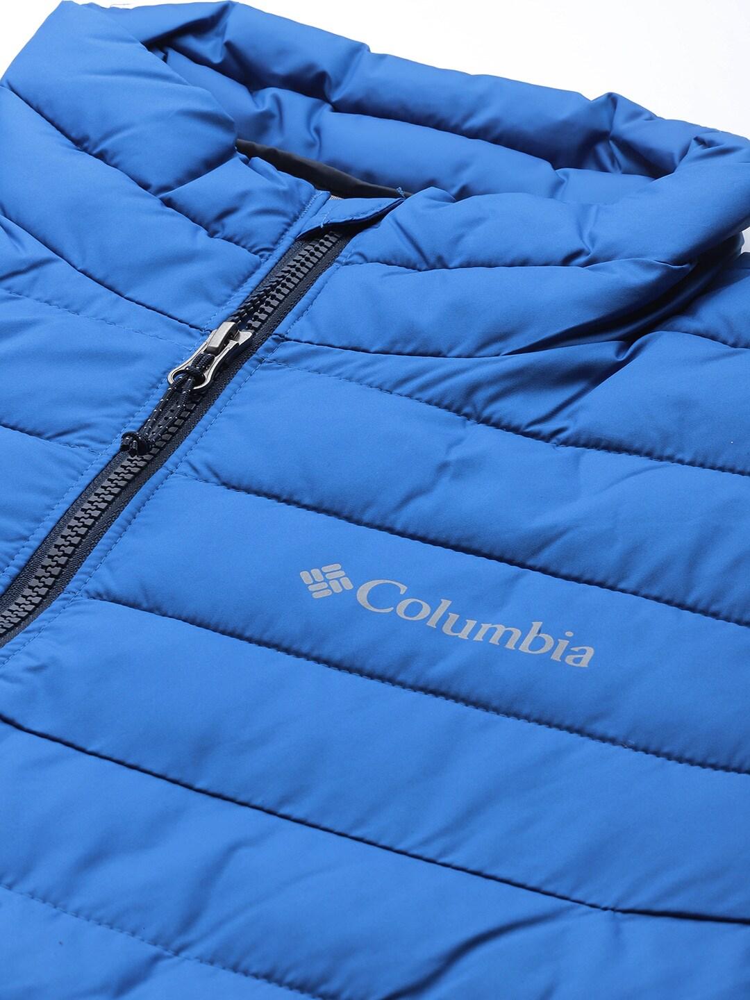 A Men Wearing Columbia Men Blue Powder Lite Jacket