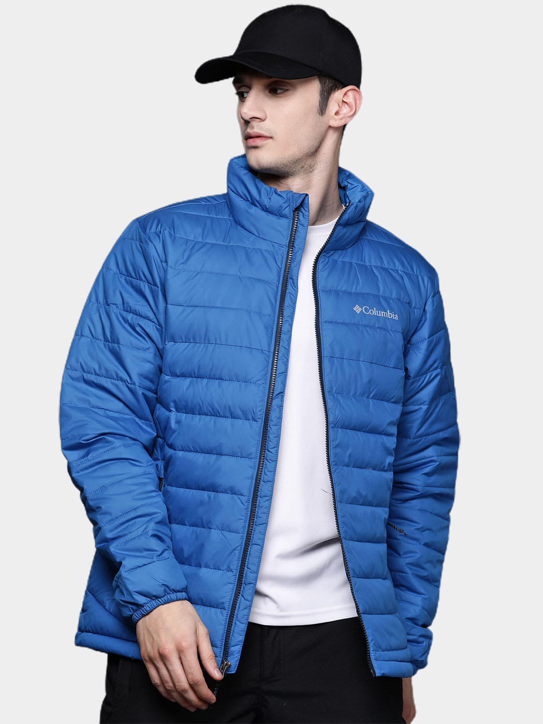 A Men Wearing Columbia Men Blue Powder Lite Jacket