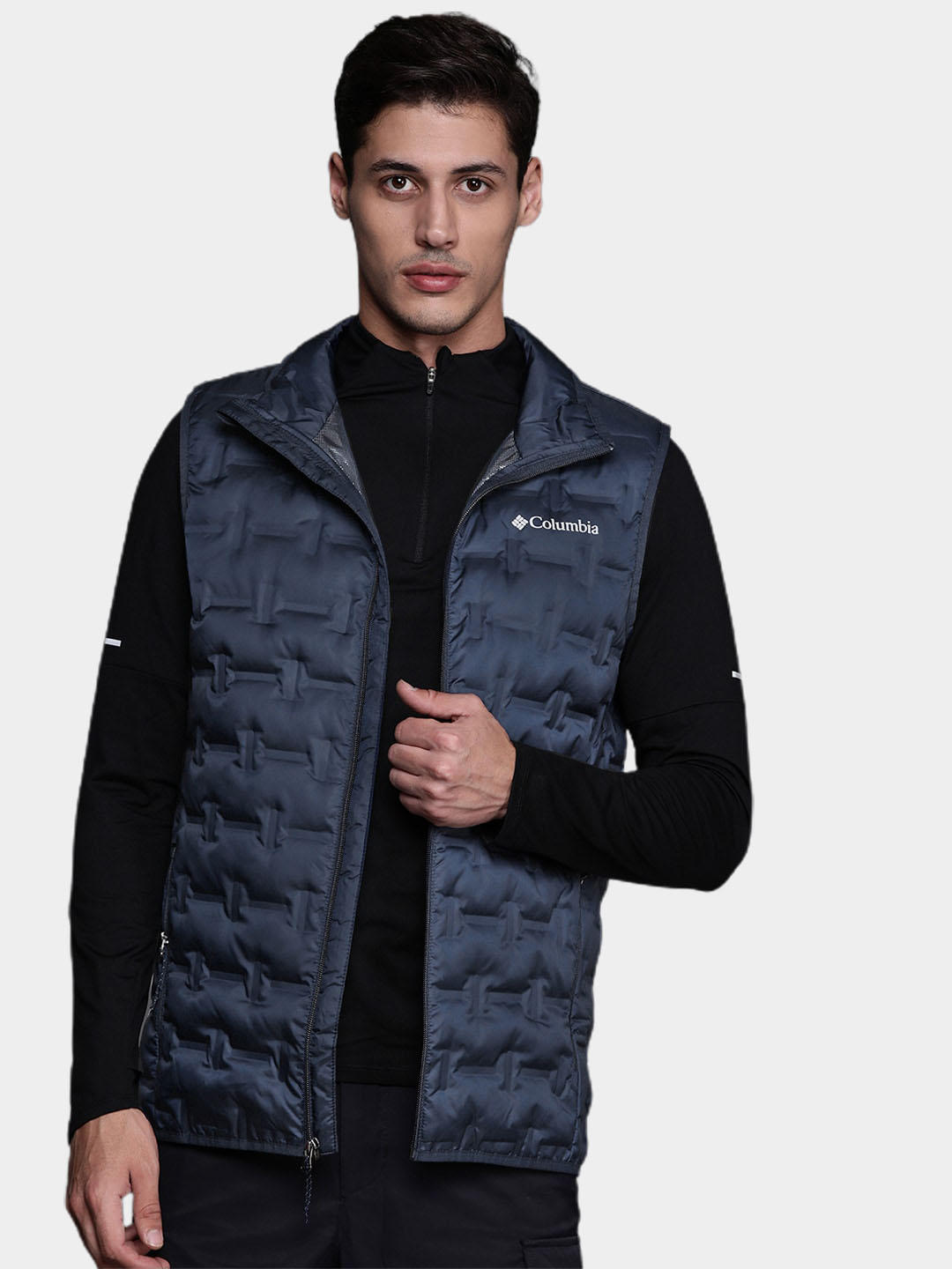 A Men Wearing Columbia Men Blue Delta Ridge Down Vest
