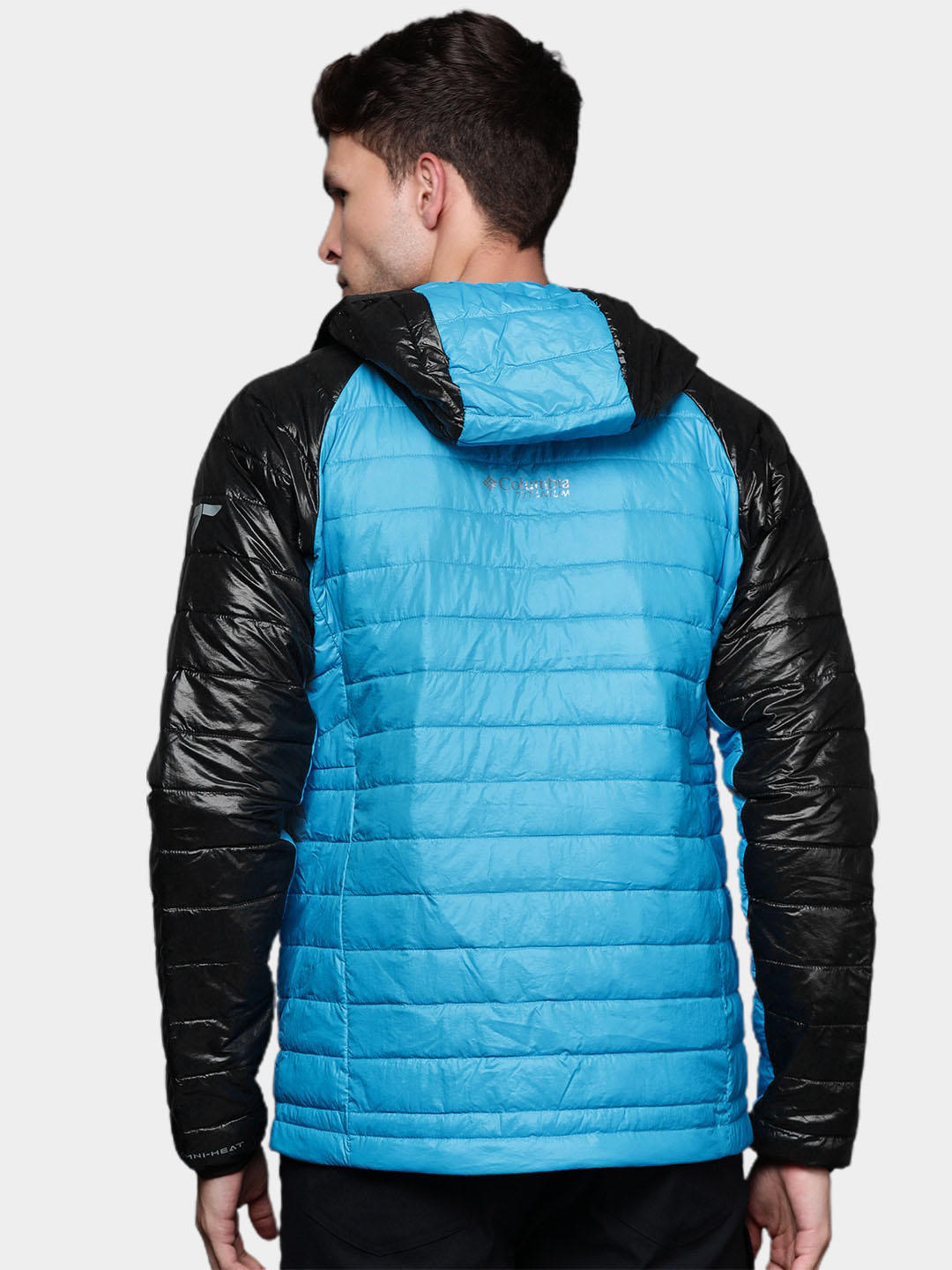 A Men Wearing Columbia Men Blue Platinum Peak Hooded Jacket