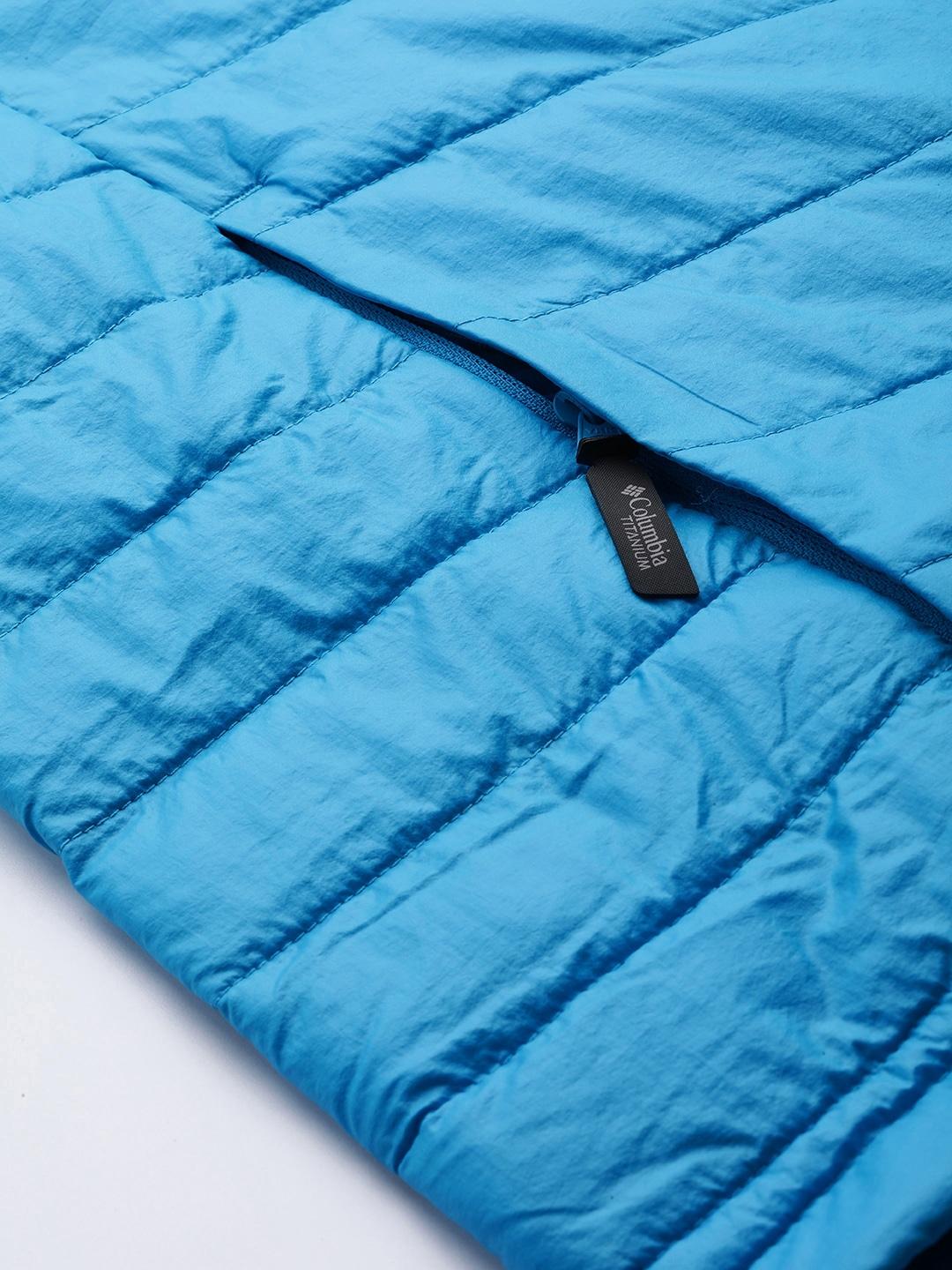 A Men Wearing Columbia Men Blue Platinum Peak Hooded Jacket