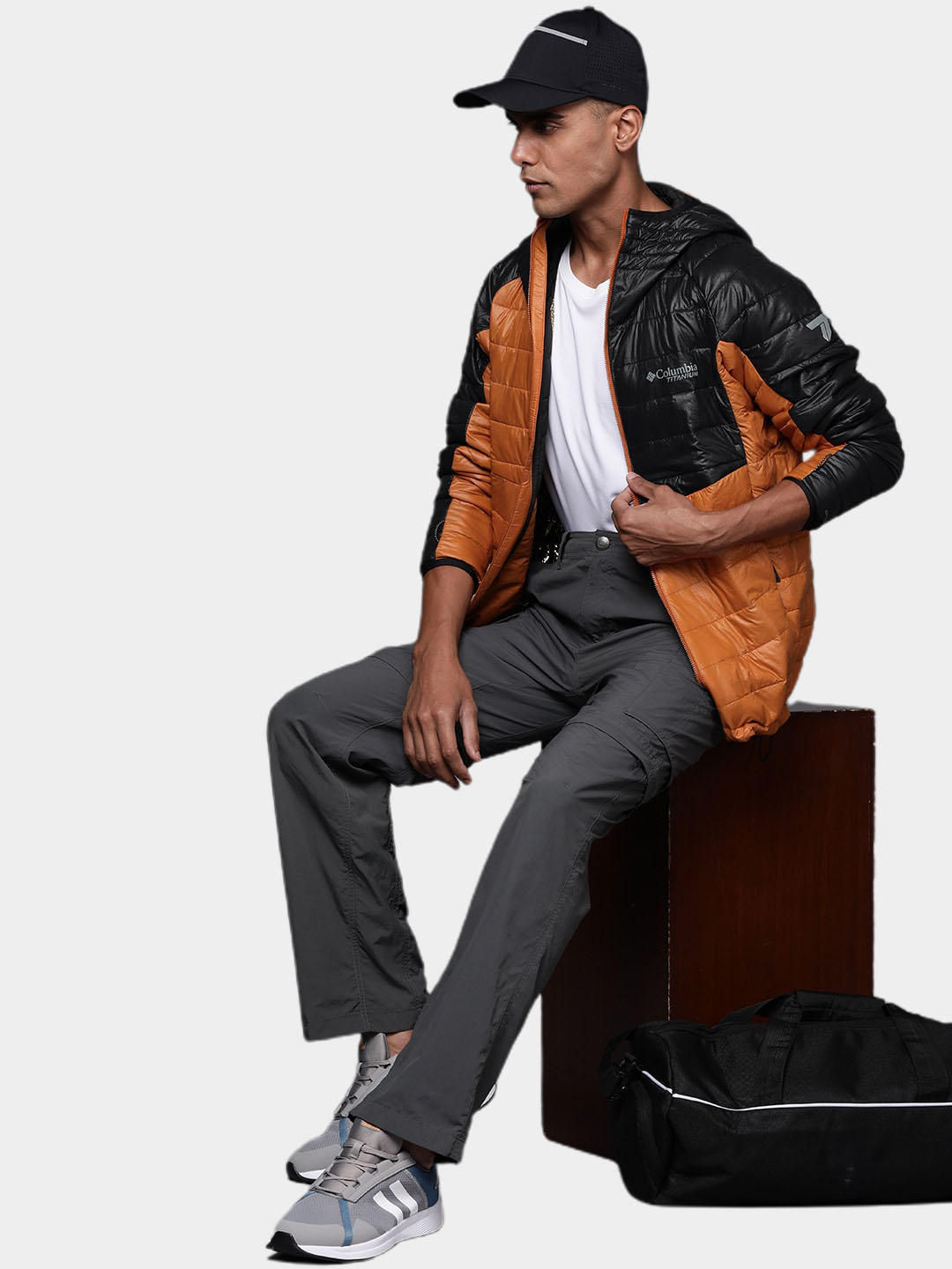 A Men Wearing Columbia Men Orange Platinum Peak Hooded Jacket