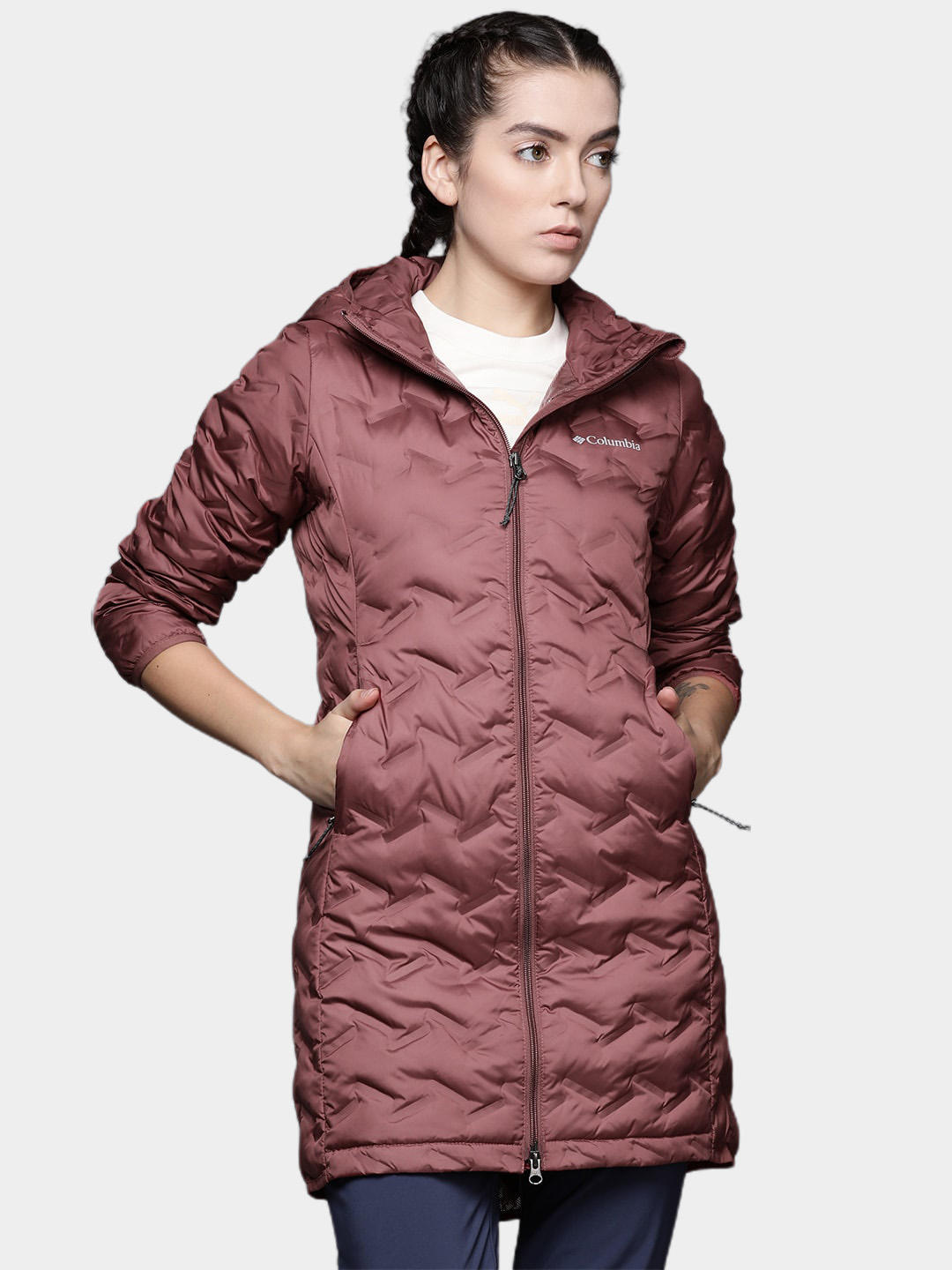 A Women Wearing Columbia Women Pink Delta Ridge Long Down Jacket