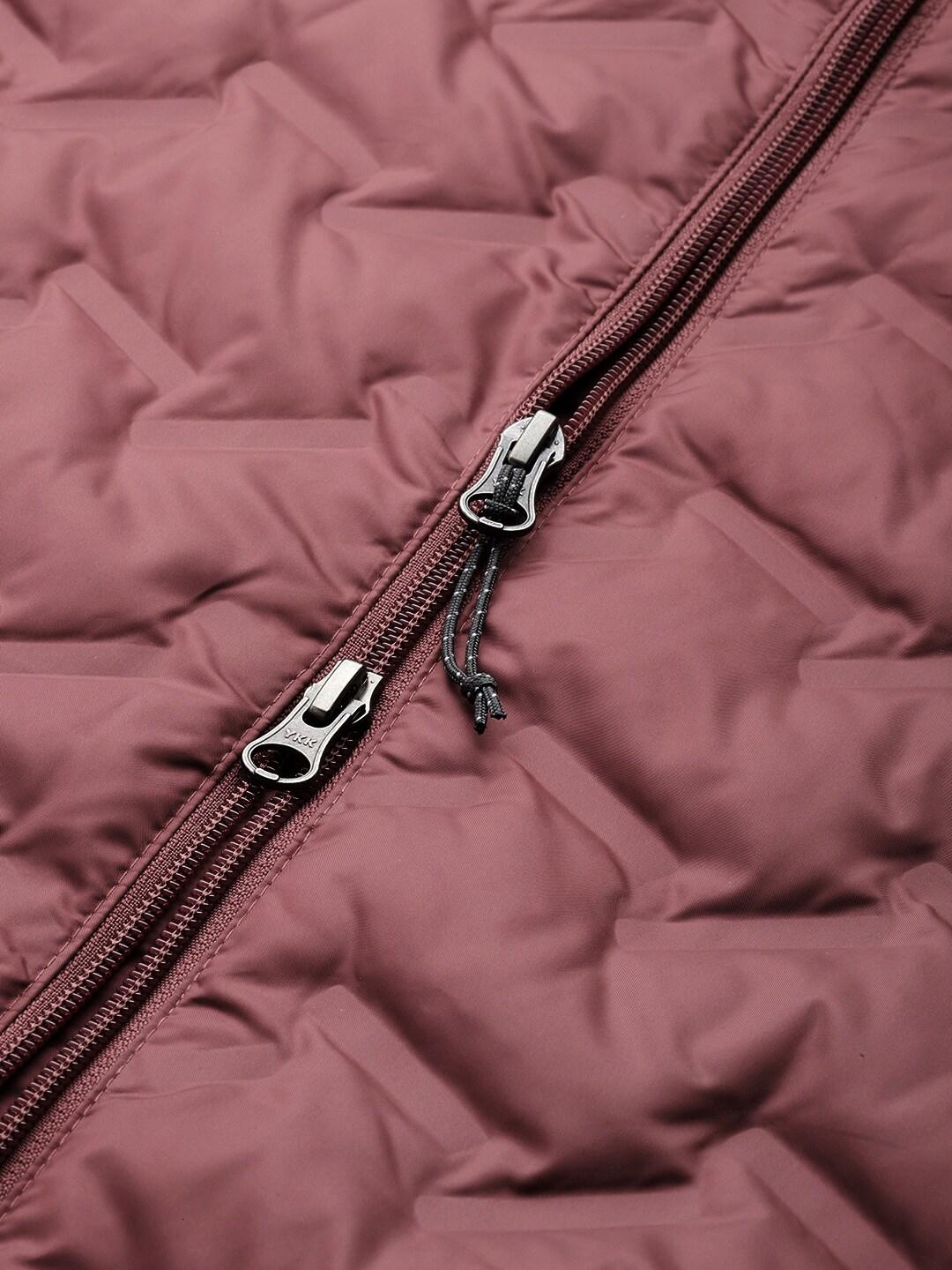 A Women Wearing Columbia Women Pink Delta Ridge Long Down Jacket