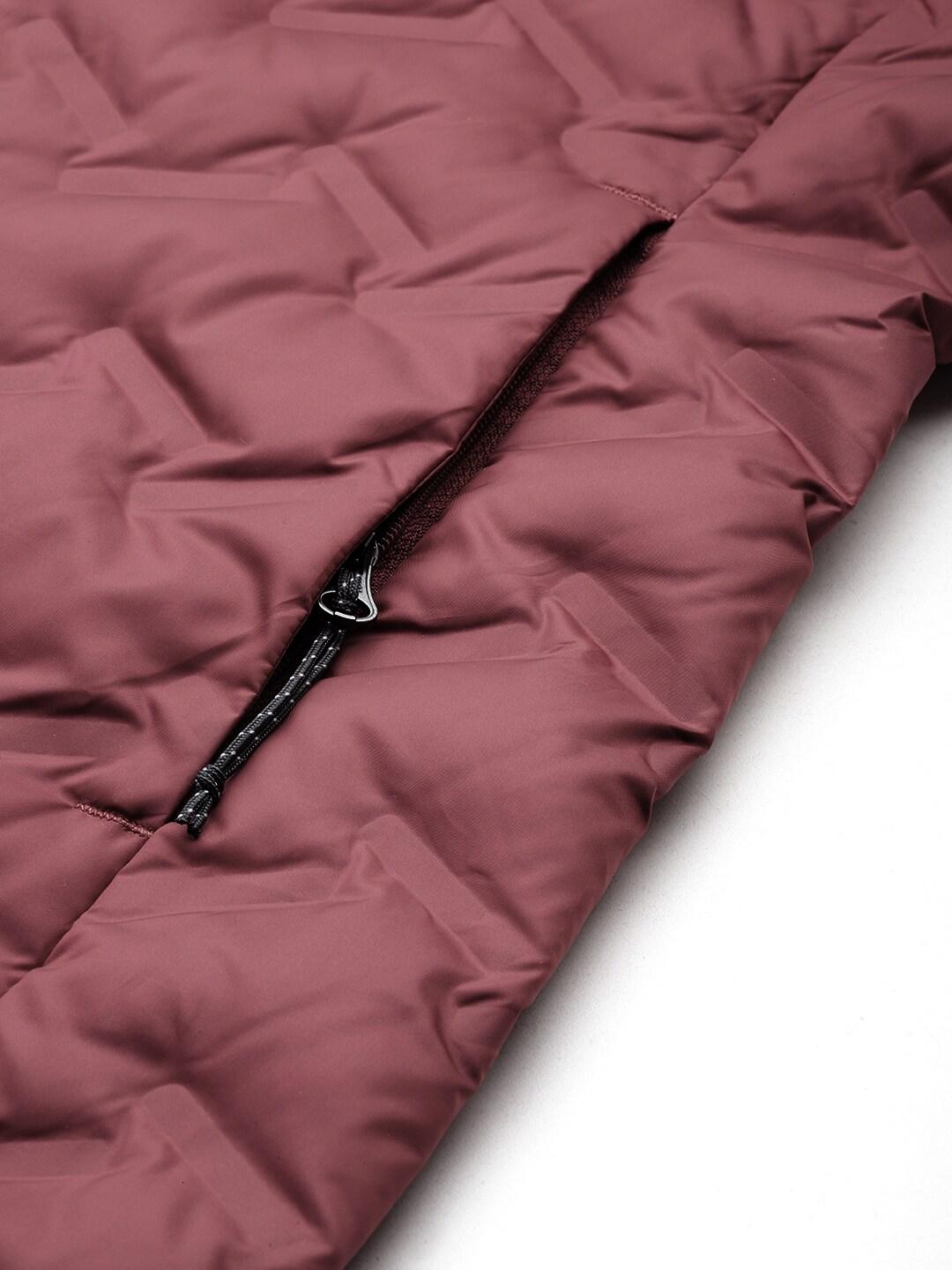 A Women Wearing Columbia Women Pink Delta Ridge Long Down Jacket