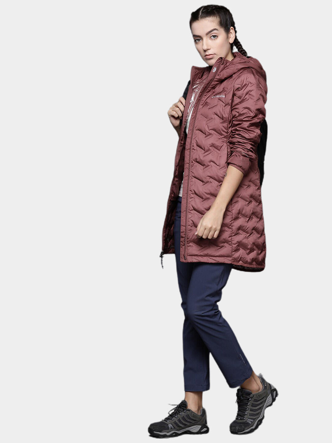 A Women Wearing Columbia Women Pink Delta Ridge Long Down Jacket