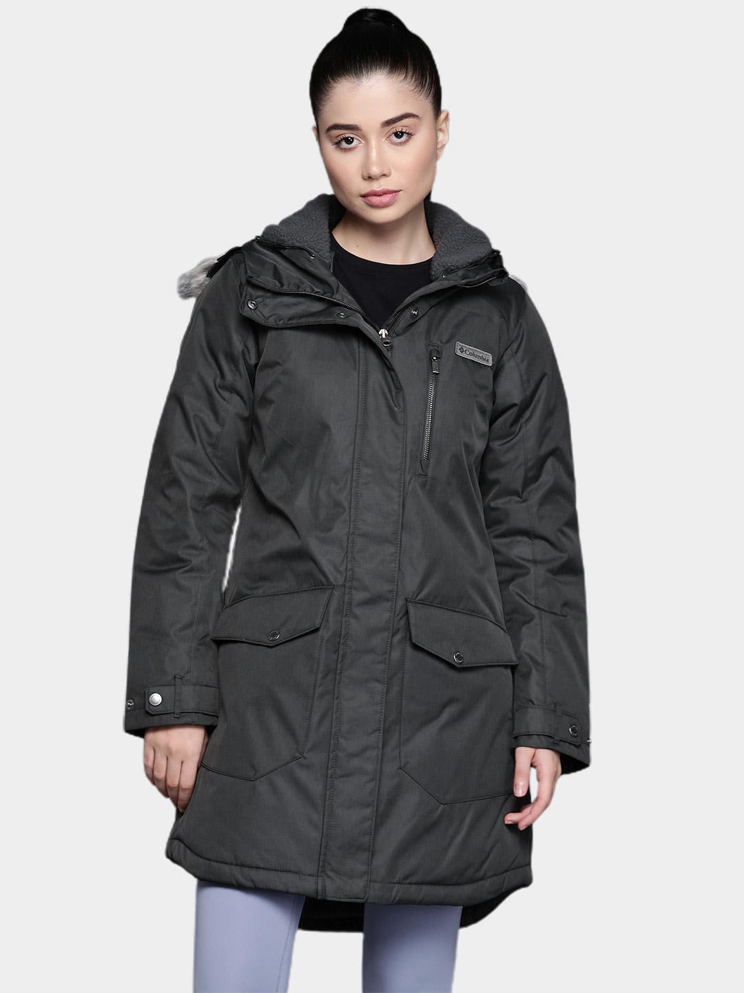 A Women Wearing Columbia Women Black Suttle Mountain Long Insulated Jacket