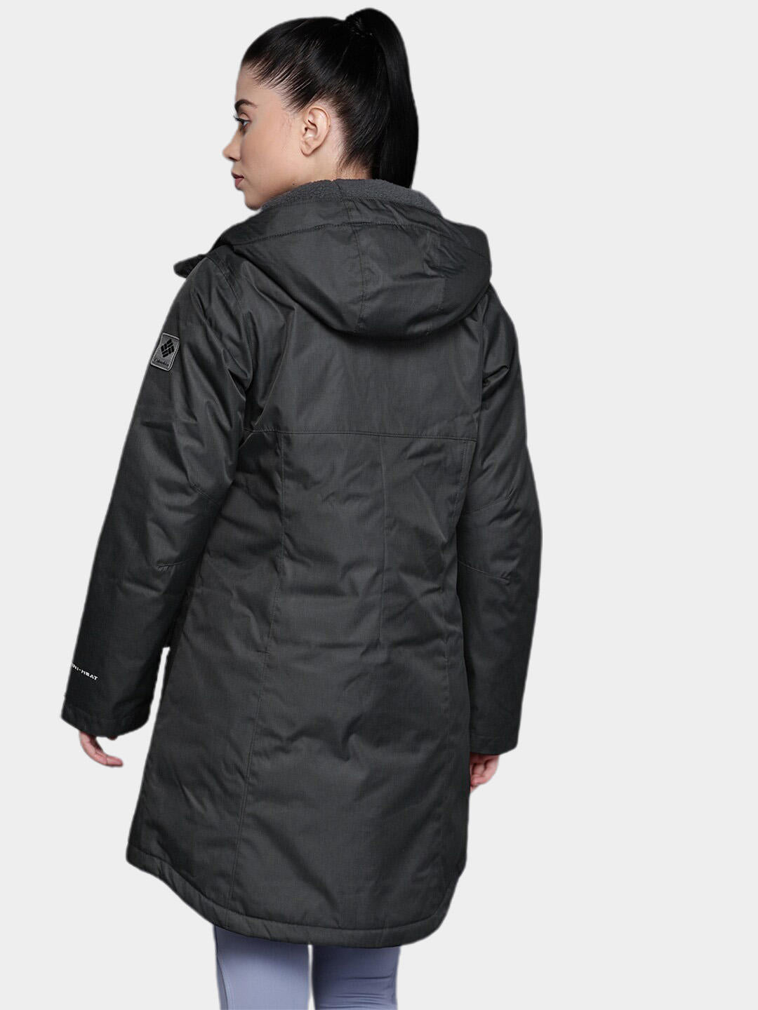 A Women Wearing Columbia Women Black Suttle Mountain Long Insulated Jacket
