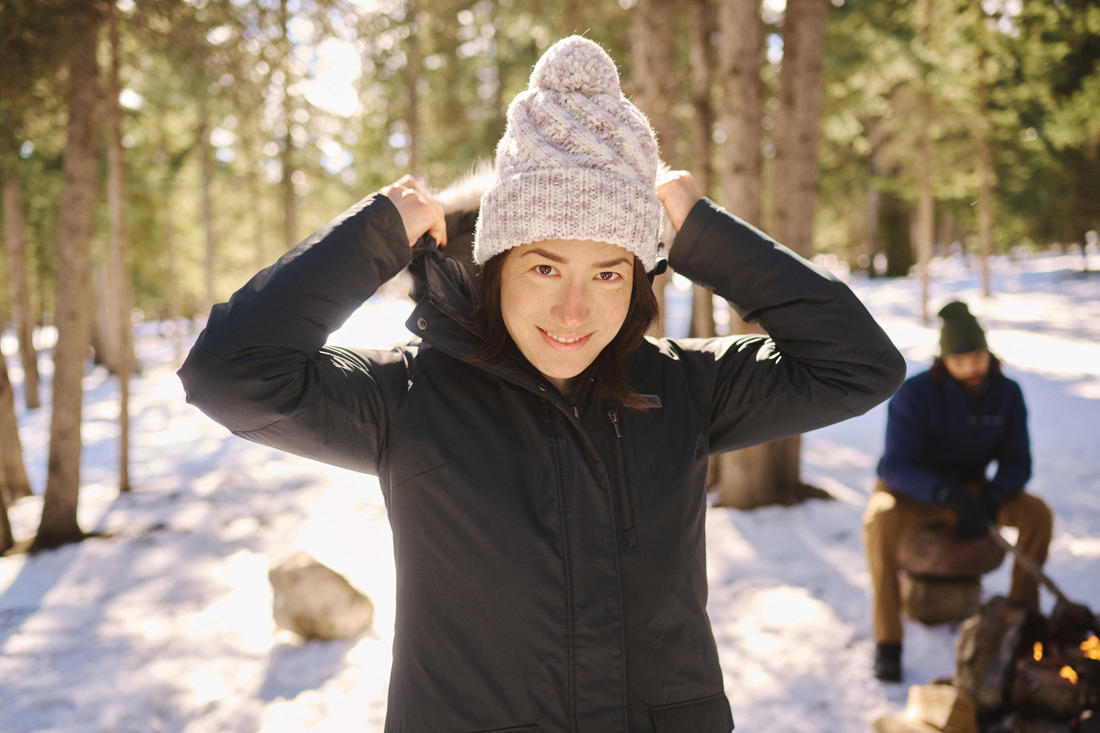 A Women Wearing Columbia Women Black Suttle Mountain Long Insulated Jacket