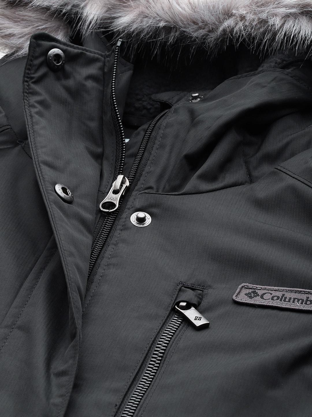 A Women Wearing Columbia Women Black Suttle Mountain Long Insulated Jacket