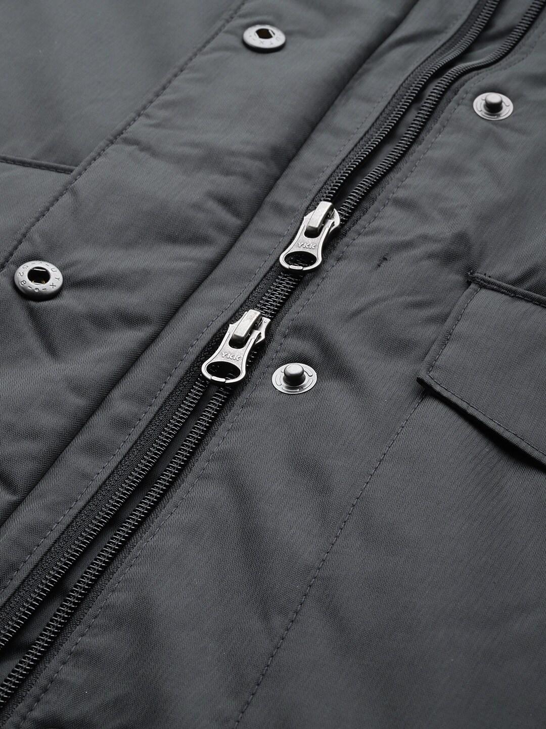 A Women Wearing Columbia Women Black Suttle Mountain Long Insulated Jacket