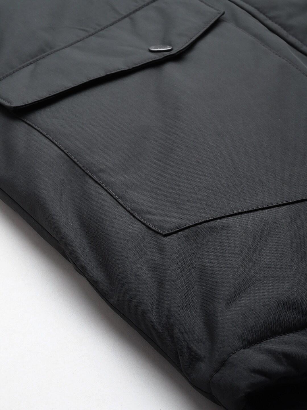 A Women Wearing Columbia Women Black Suttle Mountain Long Insulated Jacket