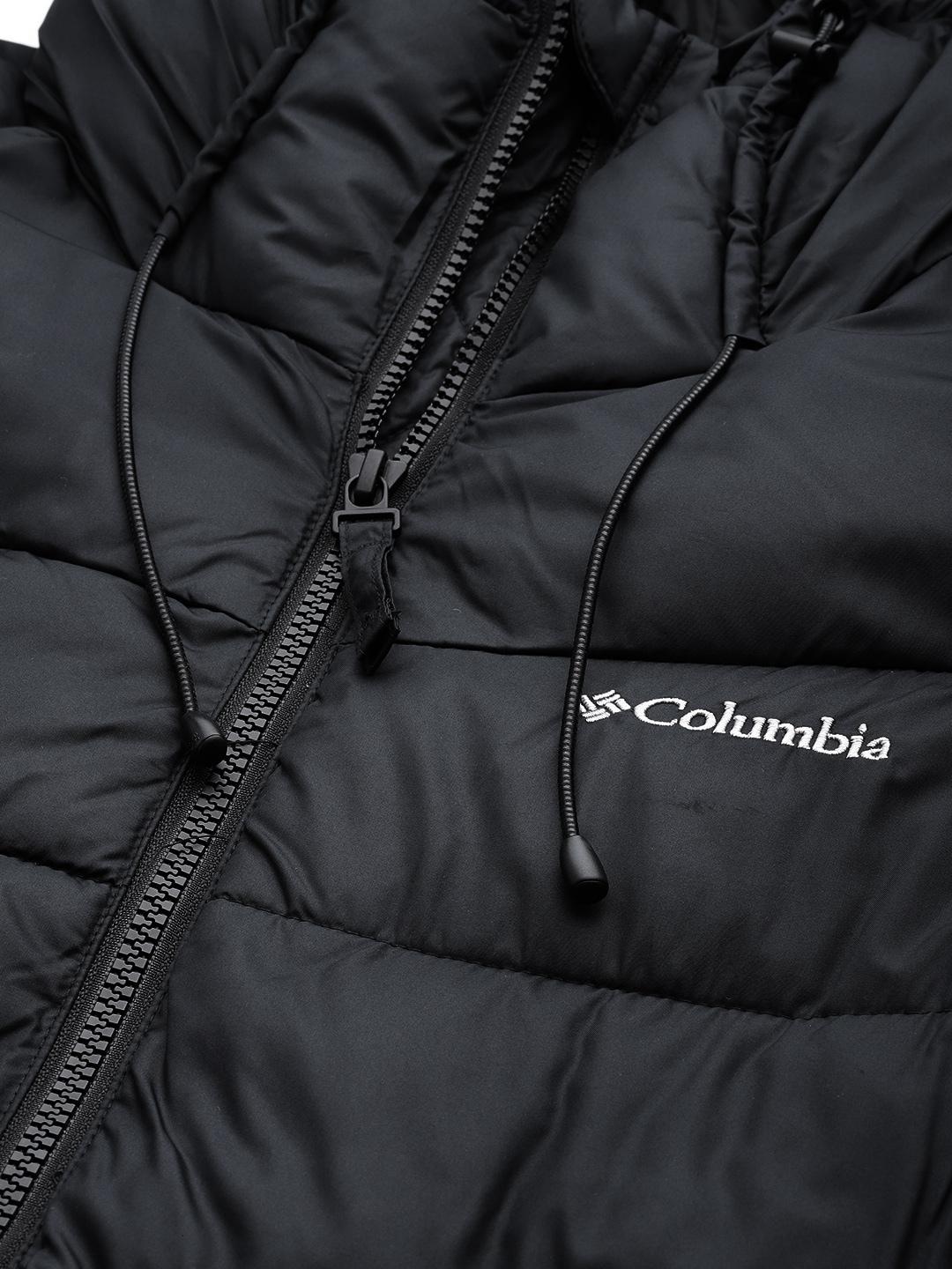 A Women Wearing Columbia Women Black Pike Lake II Long Jacket