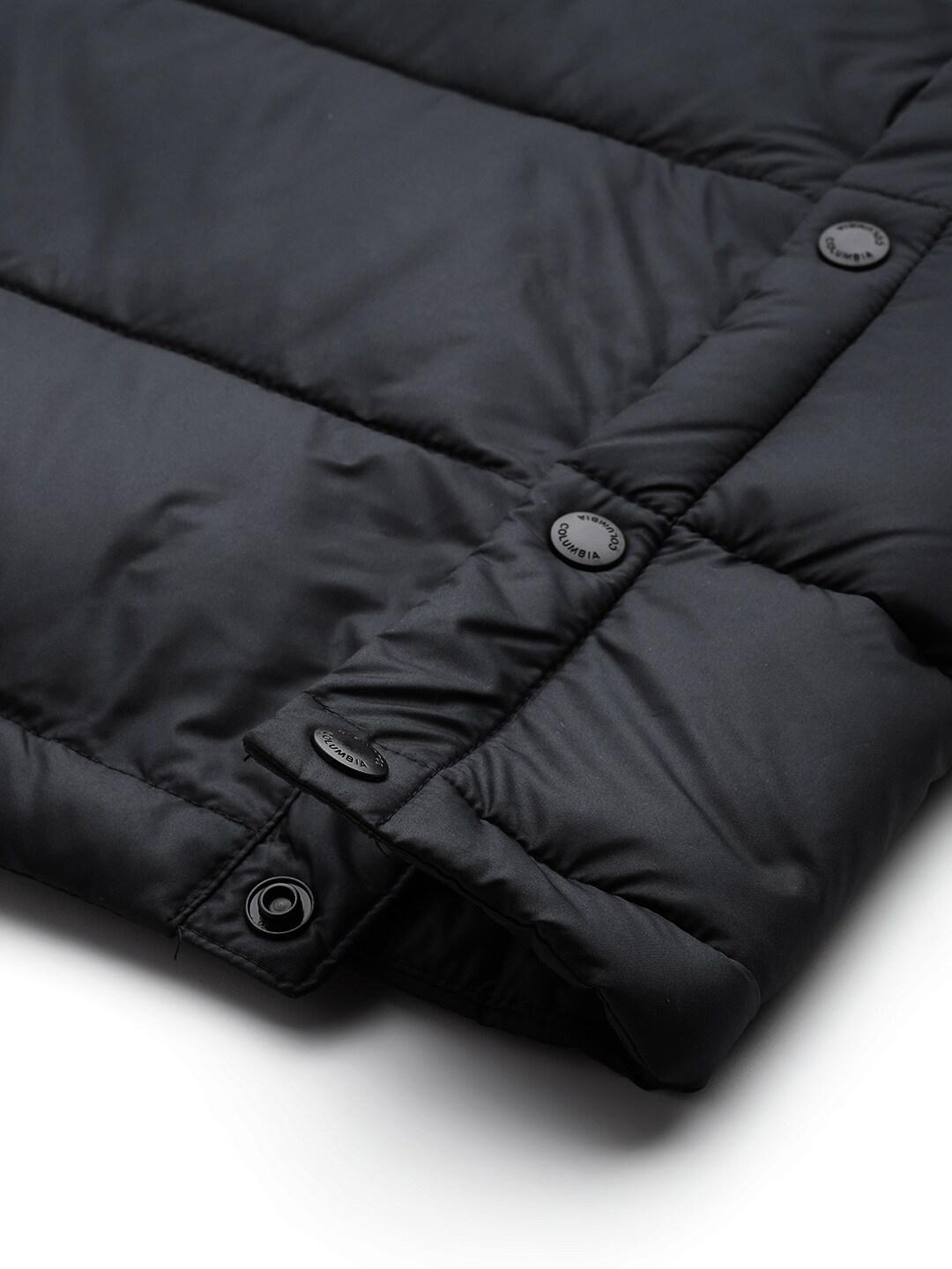 A Women Wearing Columbia Women Black Pike Lake II Long Jacket