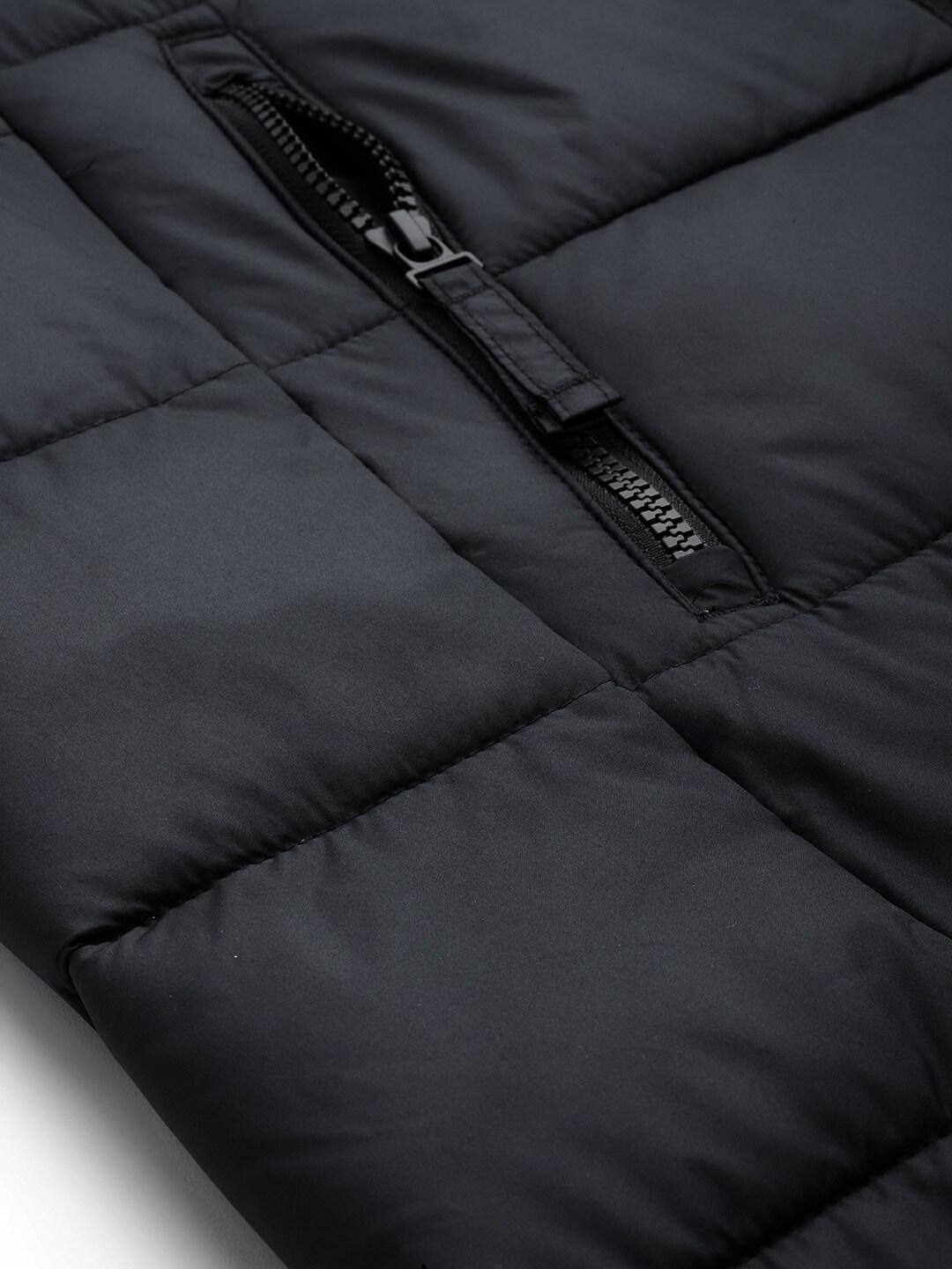 A Women Wearing Columbia Women Black Pike Lake II Long Jacket