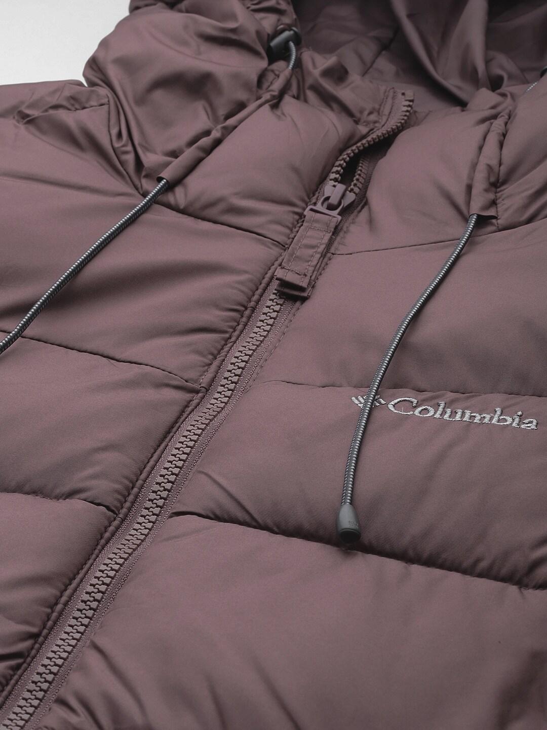 A Women Wearing Columbia Women Brown Pike Lake II Long Jacket