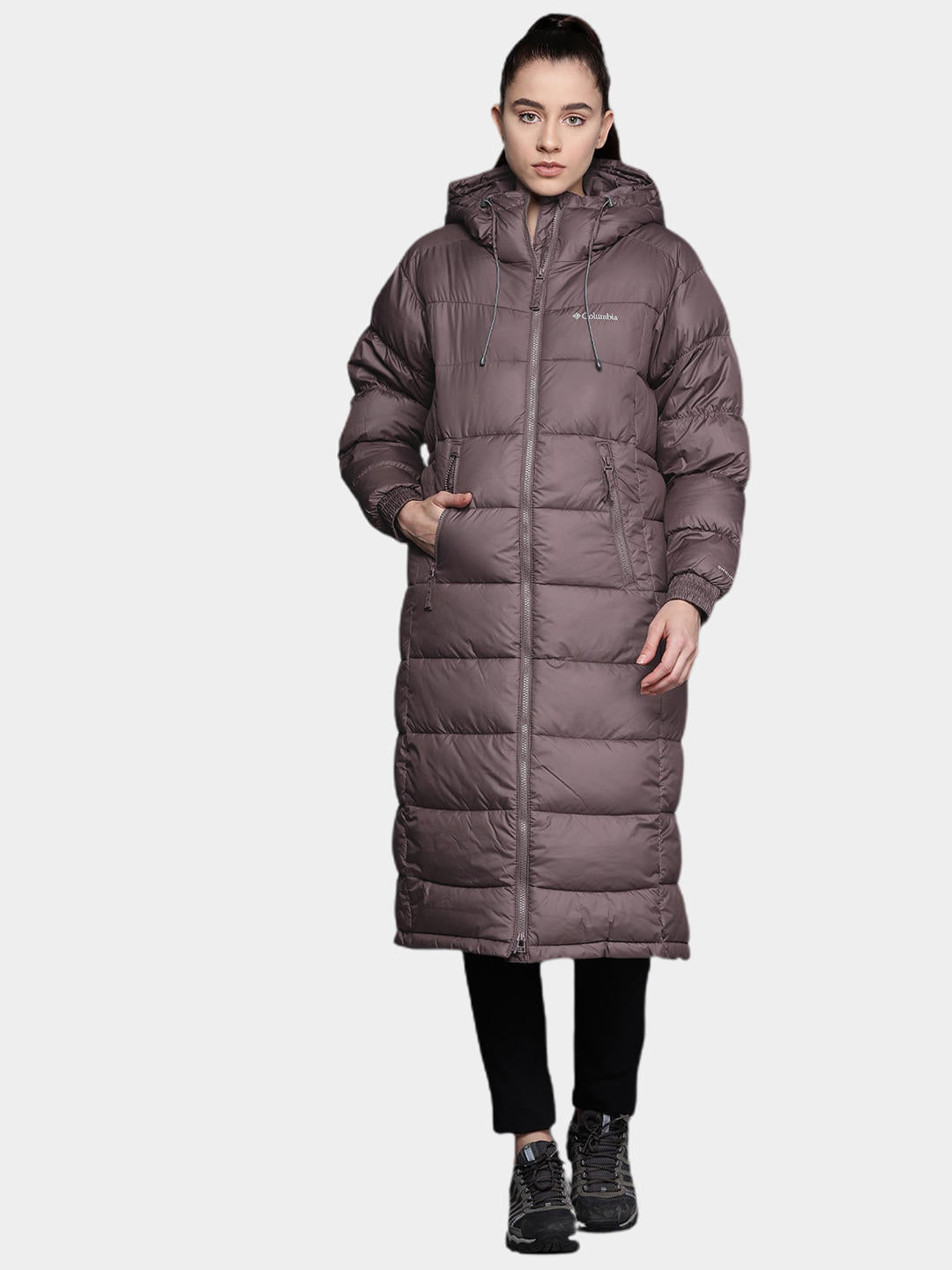 A Women Wearing Columbia Women Brown Pike Lake II Long Jacket