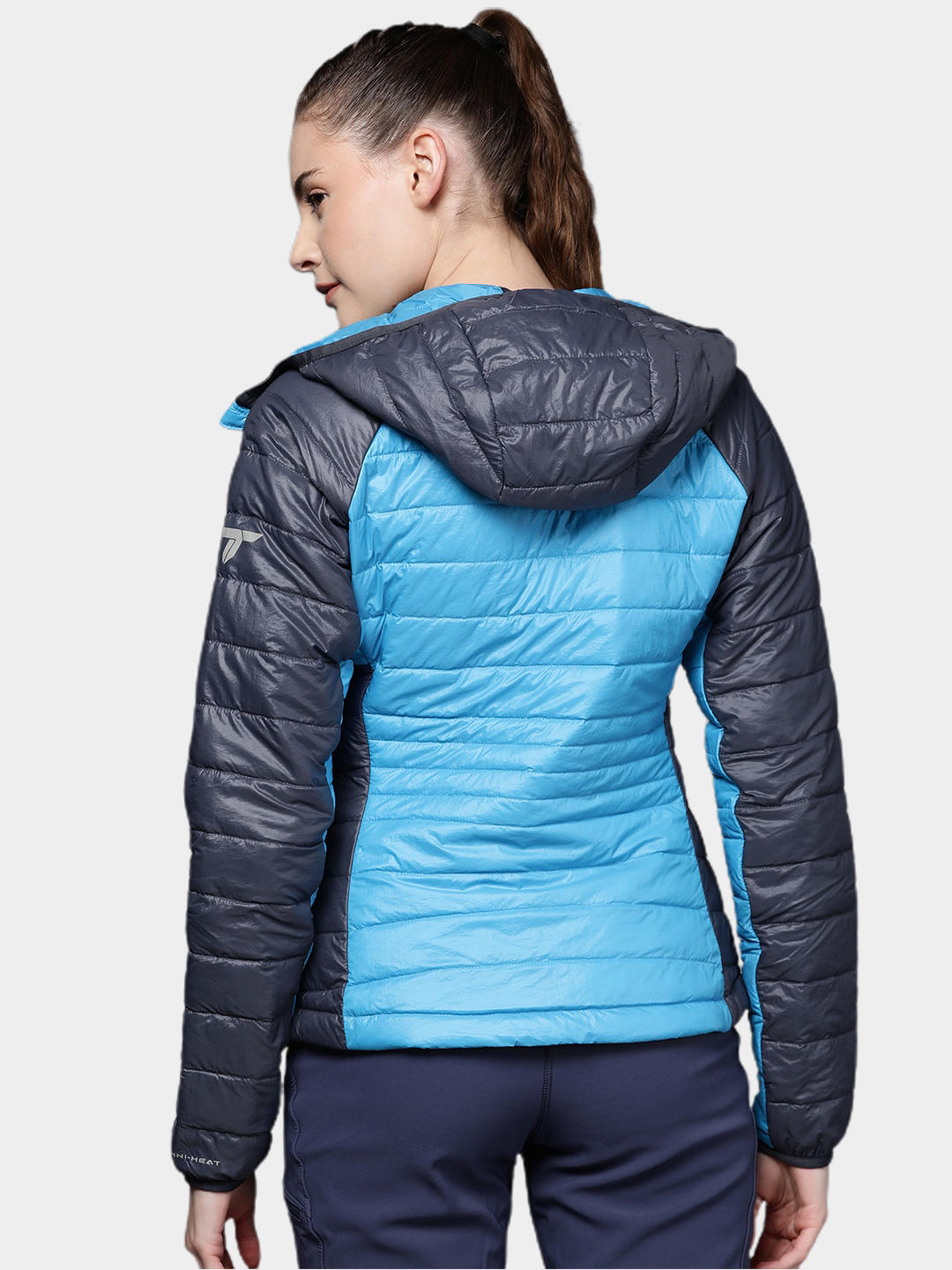 A Women Wearing Columbia Women Blue Platinum Peak Hooded Jacket