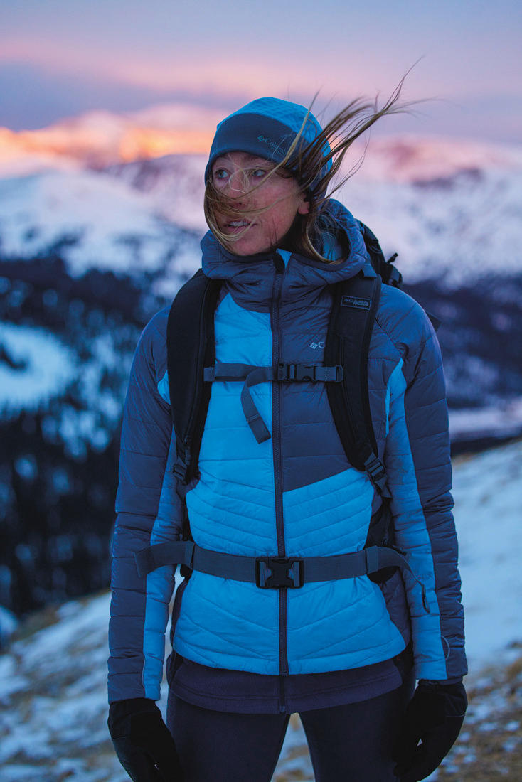 A Women Wearing Columbia Women Blue Platinum Peak Hooded Jacket