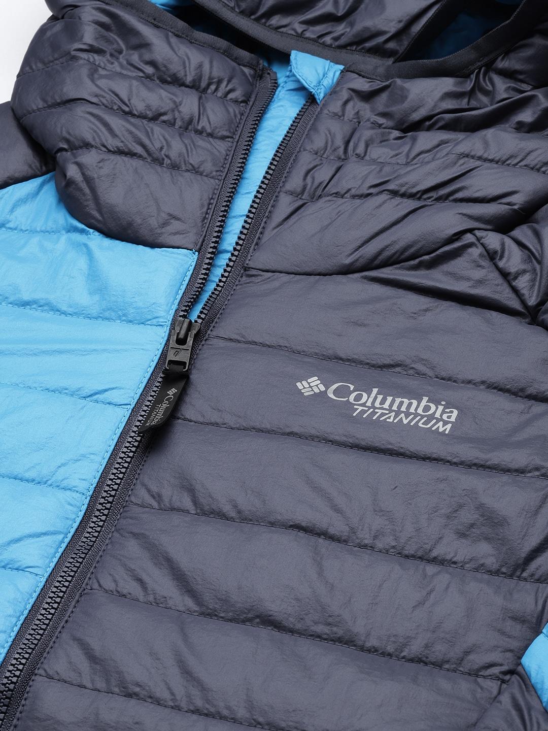 A Women Wearing Columbia Women Blue Platinum Peak Hooded Jacket