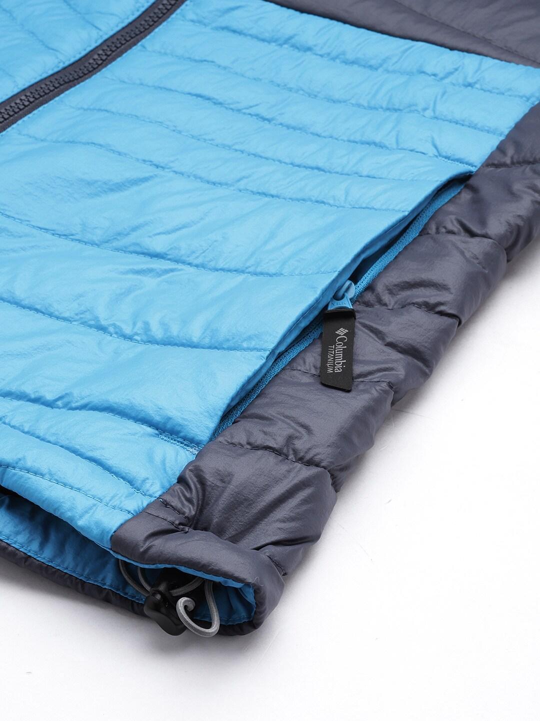 A Women Wearing Columbia Women Blue Platinum Peak Hooded Jacket